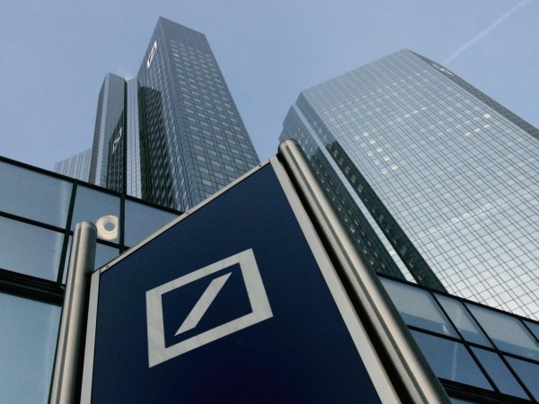 Surprise profit from Deutsche Bank but still overshadowed by massive US fine