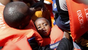Thousands of migrants are rescued at sea in the biggest operation so far