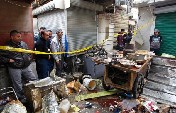 Deadly double bombing at Baghdad market