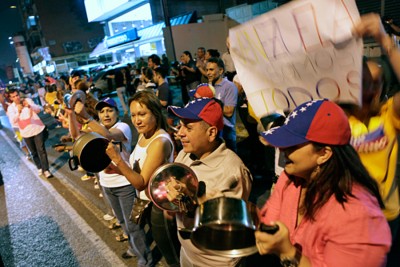 Venezuelan president chased by pot-banging protesters