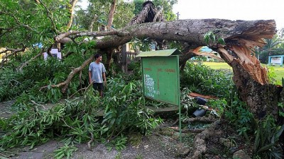 Typhoon Nock-ten roars through Philippines, killing four people