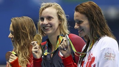 Ledecky wins 800-metres freestyle, completes rare Olympic swimming treble
