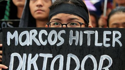 Angry Filipinos march against burial with military honours of Ferdinand Campos