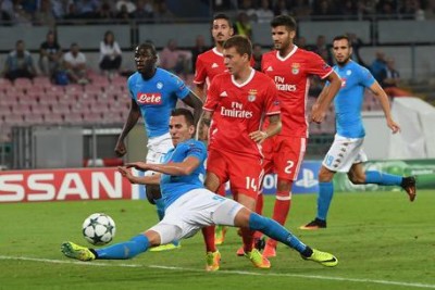 Soccer: Napoli thump Benfica to stay perfect in Champions League