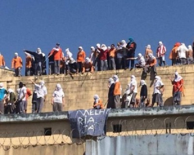 Brazil: decapitated bodies tossed over wall as dozens die in prison drug gang turf war