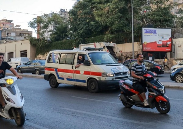 Afp - Lebanese Red Cross ambulance rushes wounded people to a hospital in Beirut on September 