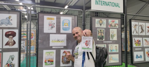 Paolo Piccione e le sue vignette al 42° Salon International de la Caricature du Dessin de Presse et d’Humour di Saint Just Le Martel. 