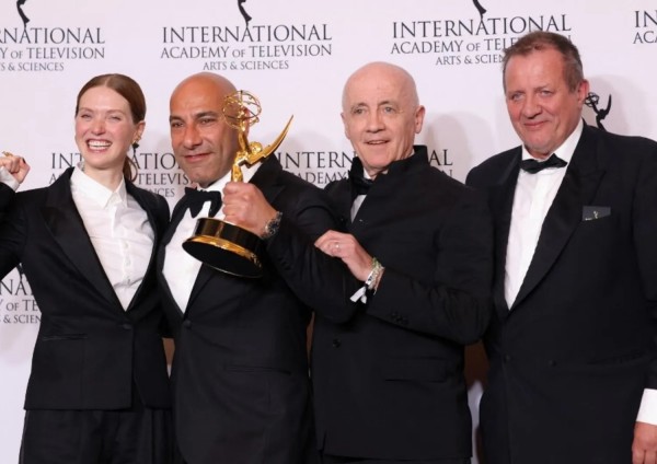 French actress Fleur Geffrier , producer Sam Kozhaya, executive producer Jean Luc Berlot and director Alfred Lot pose with the Drama Series award for &quot;Les Gouttes de Dieu [Drops of God]&quot;
