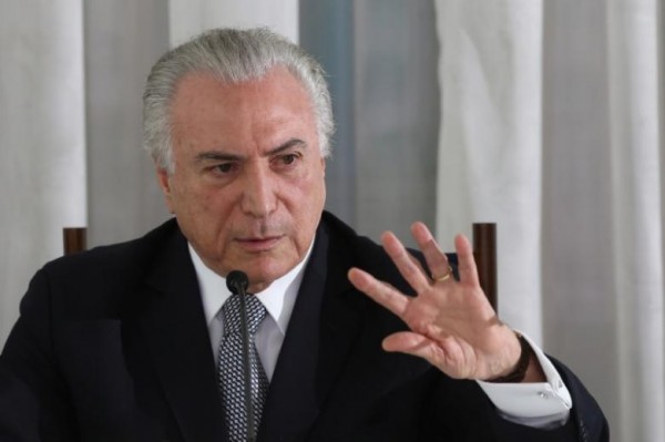 Corruption probe clouds survival of Brazil's transition leader